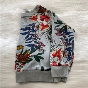 Lightweight floral sweater.